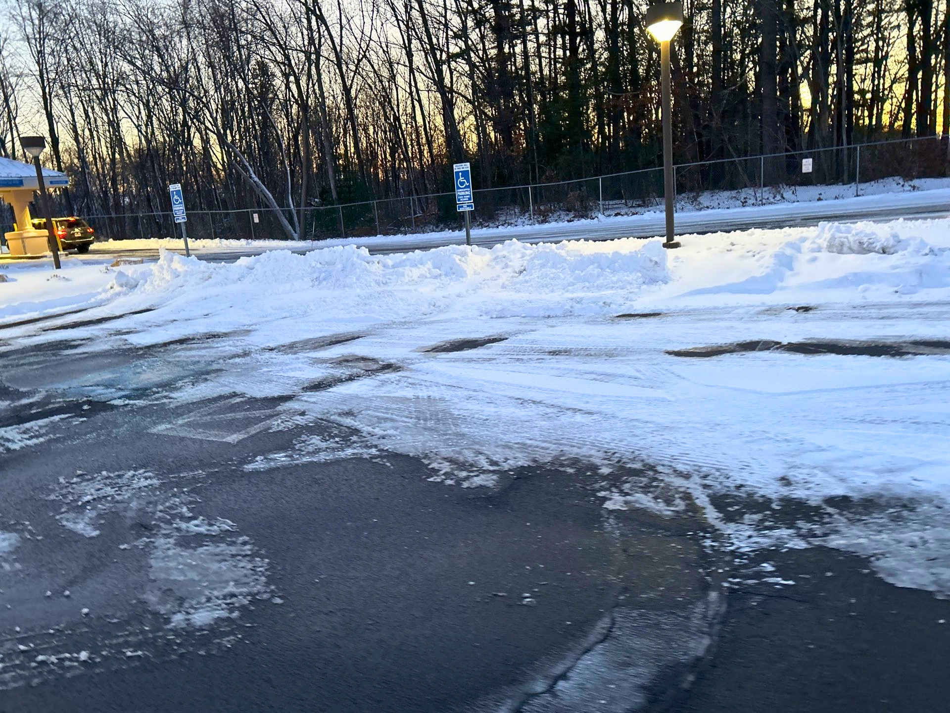Handicap parking spot not plowed or salted after winter storm