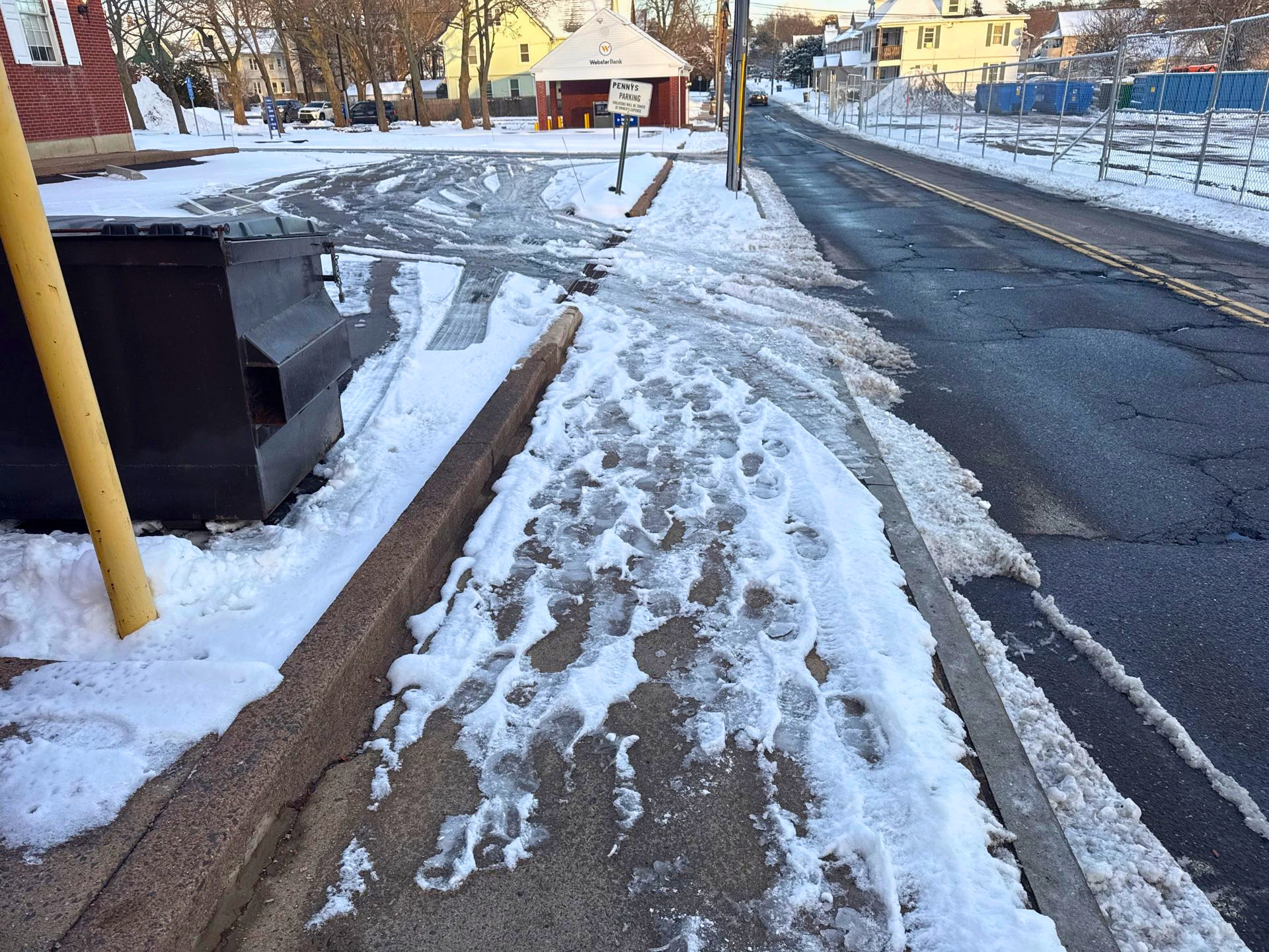 Sidewalk and entrance not shoveled or salted after winter weather